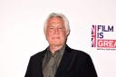 George Lazenby has retired from acting (Ian West/PA)