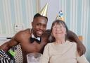 A butler in the buff surprised residents at a care home in the Lowestoft area - as three milestone birthdays were marked. Picture: The Dell Care Home