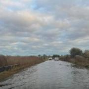 Potters Bridge in Southwold is flooded after heavy rainfall