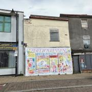 The prominent commercial property at 87 High Street in Lowestoft (centre) has sold at auction. Picture: Auction House East Anglia