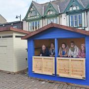 Mayor of Lowestoft Nasima Begum and Lowestoft town councillors at the official unveiling of the new kiosks in the Triangle Market area. Picture: Mick Howes