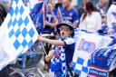 An Ipswich Town fan ahead of an open-top bus parade in Ipswich to celebrate promotion to the Premier League.