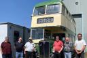 Transport Museum volunteers with the bus recently returned to Ipswich.