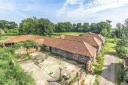 The plans to convert barns into three homes have been approved