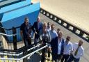 Dignitaries at the official opening of Eastern Edge, 72 contemporary beach huts on Lowestoft seafront.