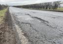 A pothole in a road in Long Melford