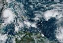 This satellite image provided by NOAA shows Hurricane Rafael on Wednesday (NOAA via AP)