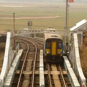 Reedham swing bridge crossing the River Yare.