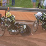 Danny King and Jason Crump chasing Nick Morris in heat five.