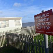 People have been evacuated from caravans after a coastal road collapsed into the sea