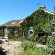 A two bedroom cottage is for sale as Dawdys Crossing Gatehouse on Burnt Hill Lane in Carlton Colville, Lowestoft is set to be auctioned off next month. Picture: Auction House East Anglia