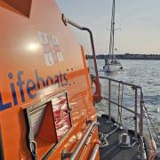 The yacht being towed by Lowestoft RNLI's relief lifeboat Eric's Legend. Picture: RNLI