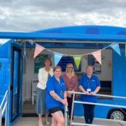 Heidi Mottram with MP Jess Asato, Julie and Sophie customer engagement team, inside Carlton the engagement vehicle