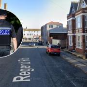 Police are appealing for witnesses after a man in a trench coat hit one young boy then racially abused another in Lowestoft