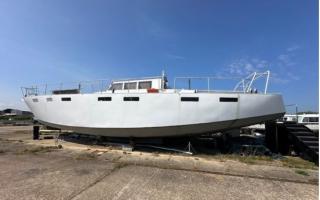 A steel hulled 60ft yacht that is custom built and comes with many fittings sold at auction.