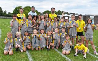 A triumphant Dell Primary School in Lowestoft after winning the Evolution Academy Trust Cup. Picture: Mick Howes
