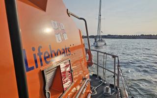 The yacht being towed by Lowestoft RNLI's relief lifeboat Eric's Legend. Picture: RNLI